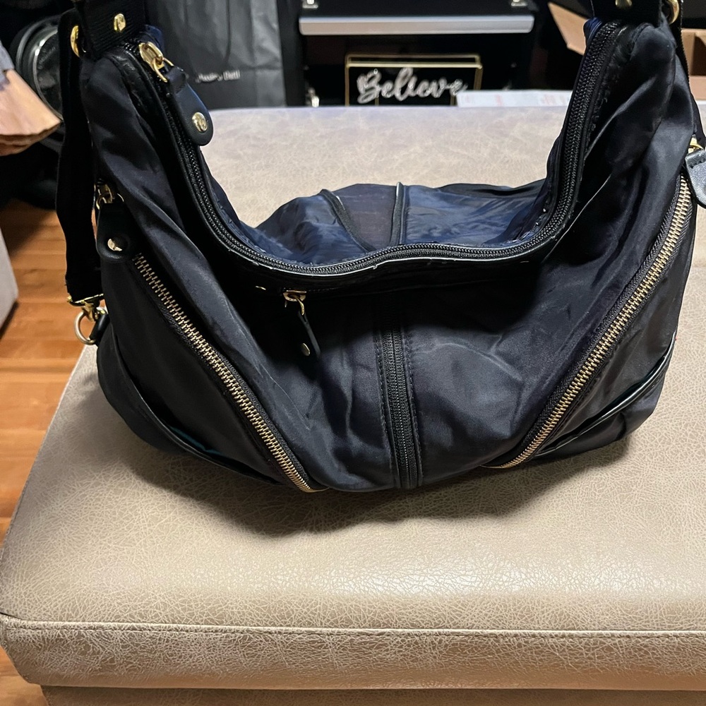 Skip and hop Black Nylon Shoulder Bag with Gold Accents